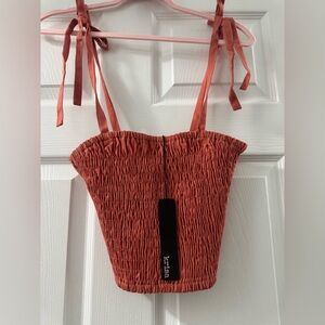 102 - NWT Revolve Krisa $110 Smocked tie top Size S